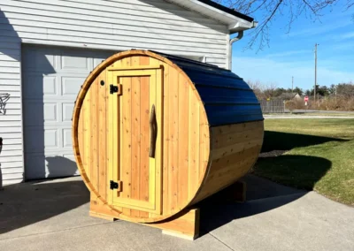 Outdoor cedar barrel sauna at the Sauna Craft shop before delivery
