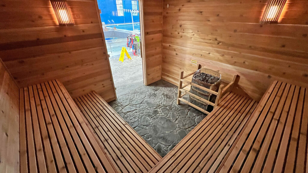 Two-level cedar benches on both sides of the 10 by 10 ft sauna Sauna Craft built at the YMCA in Kokomo